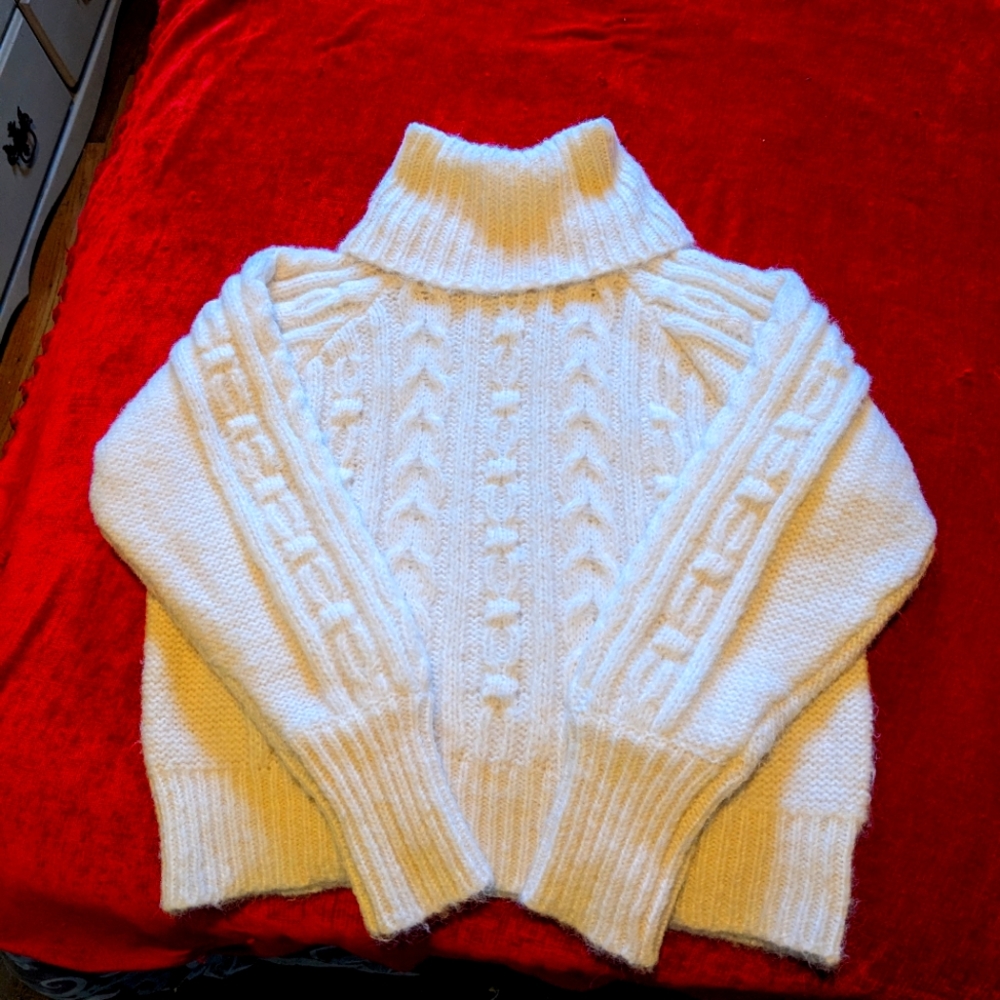 Cream colored fuzzy sweater